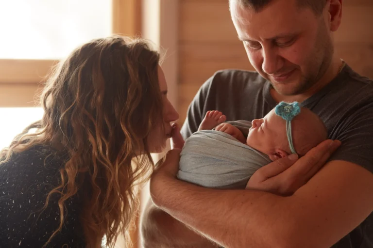 Couple holding baby after successful IVF treatment in Goa